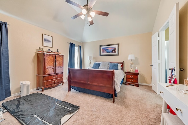 bedroom featuring lofted ceiling, carpet, baseboards, and ceiling fan