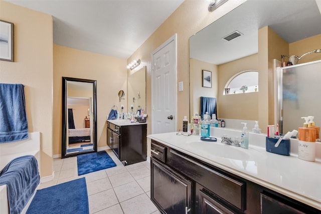 bathroom featuring visible vents, a shower with door, tile patterned floors, vanity, and a bath