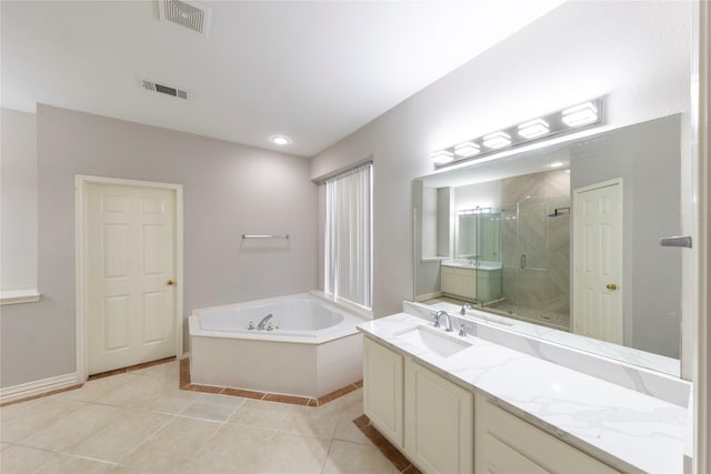 bathroom featuring a stall shower, tile patterned flooring, visible vents, and vanity