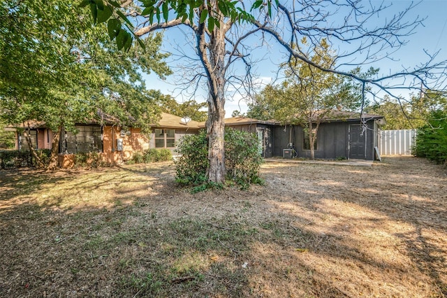 view of yard with fence