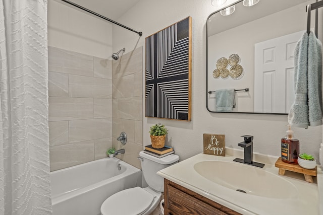 bathroom featuring toilet, shower / bath combo with shower curtain, and vanity