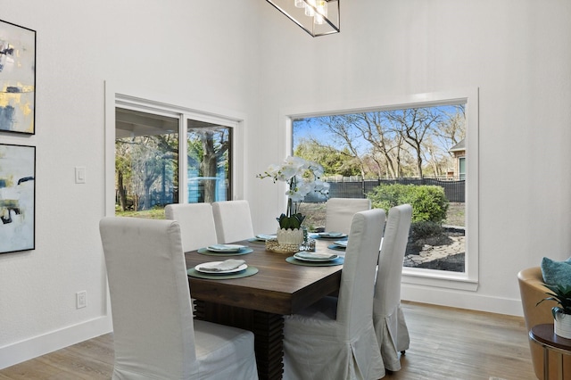 300 Covey Ln, Mckinney, TX 75071 - dining room featuring wood finished floors and baseboards