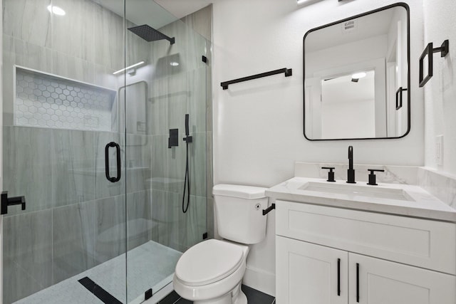 300 Covey Ln, Mckinney, TX 75071 - bathroom featuring visible vents, a stall shower, toilet, and vanity