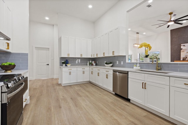 300 Covey Ln, Mckinney, TX 75071 - kitchen featuring a sink, range with electric cooktop, light countertops, and stainless steel dishwasher