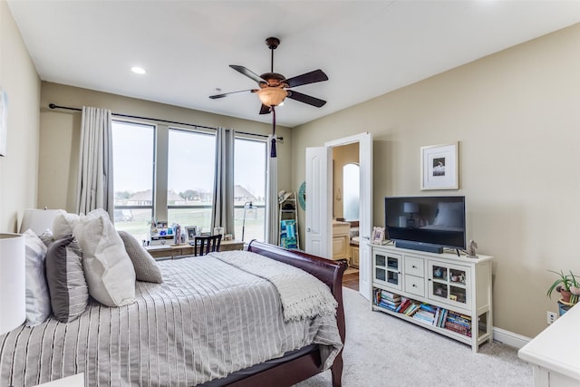 carpeted bedroom featuring ensuite bath, baseboards, ceiling fan, and recessed lighting