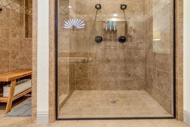 full bathroom with a stall shower