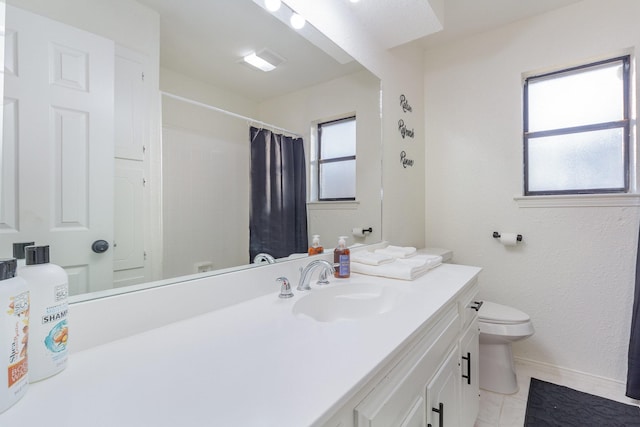 full bathroom with baseboards, toilet, curtained shower, tile patterned flooring, and vanity