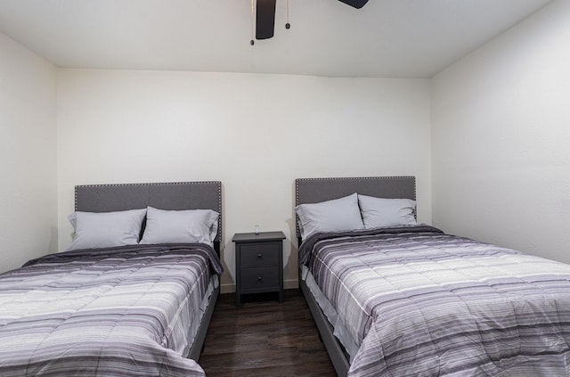 bedroom with ceiling fan and wood finished floors