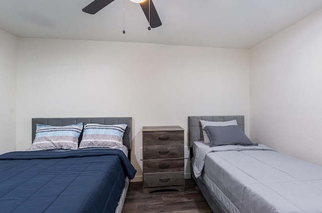 bedroom with ceiling fan and wood finished floors