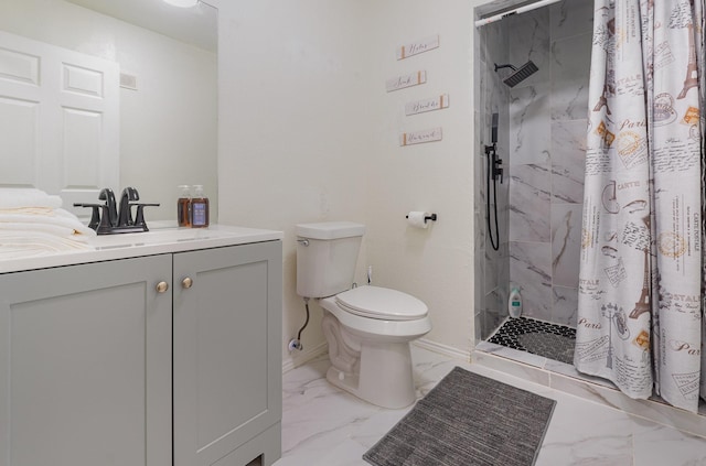 bathroom featuring a stall shower, baseboards, toilet, marble finish floor, and vanity