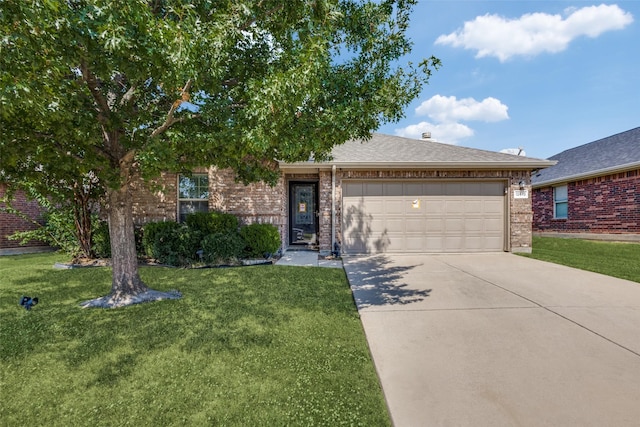 ranch-style home featuring a garage, brick siding, driveway, and a front lawn