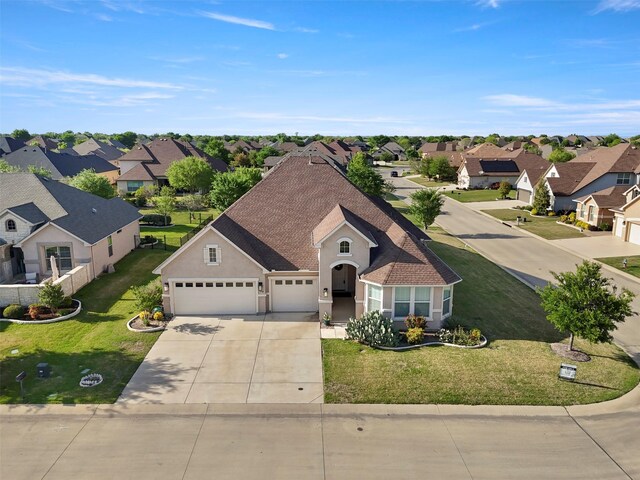 birds eye view of property featuring a residential view, a water view, and golf course view