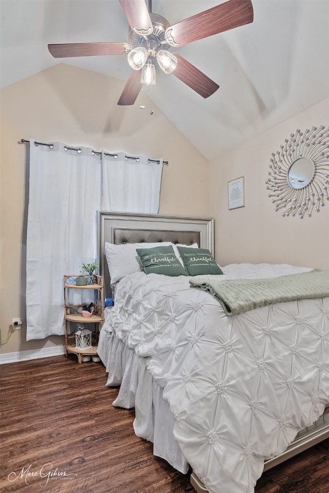 bedroom featuring lofted ceiling, ceiling fan, and wood finished floors