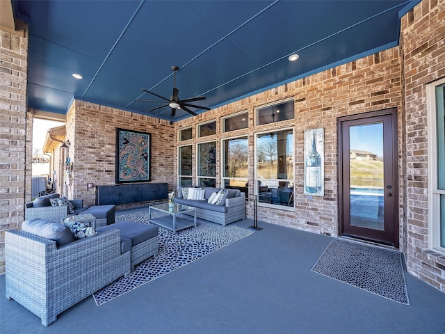 view of patio featuring ceiling fan and outdoor lounge area