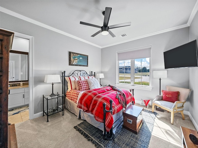 carpeted bedroom featuring ornamental molding, visible vents, ensuite bath, and baseboards