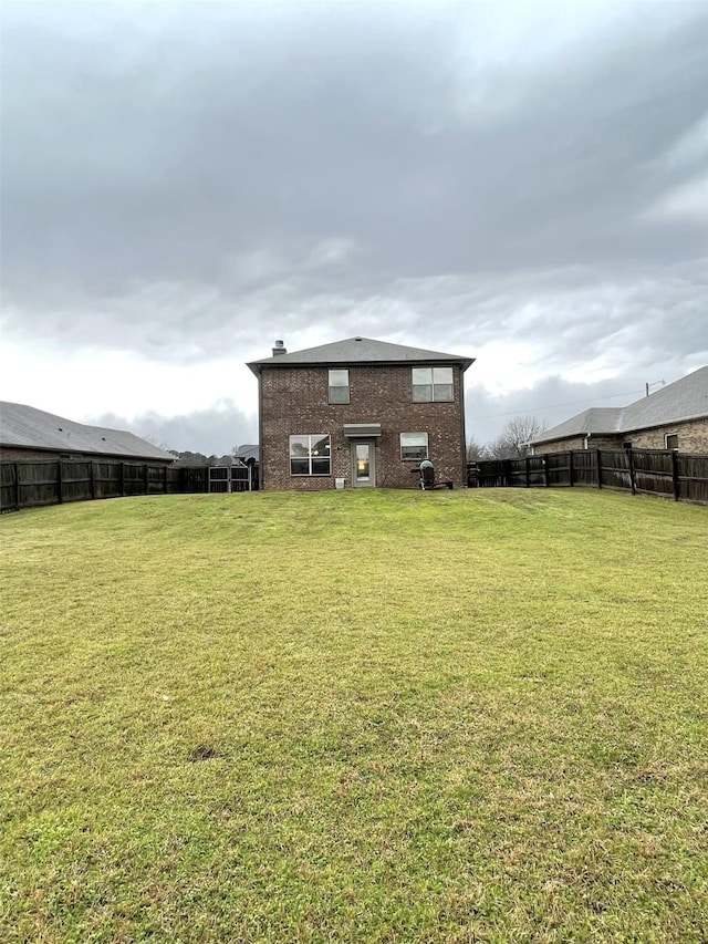 view of yard featuring a fenced backyard