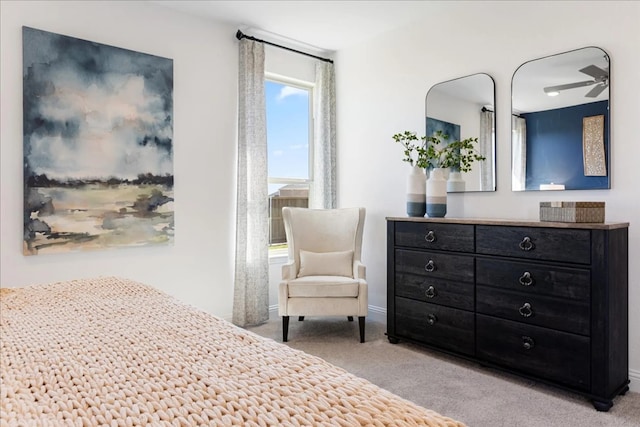 bedroom featuring carpet floors and baseboards