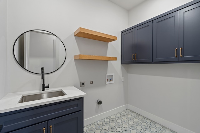 laundry area featuring cabinet space, hookup for a gas dryer, hookup for an electric dryer, washer hookup, and a sink