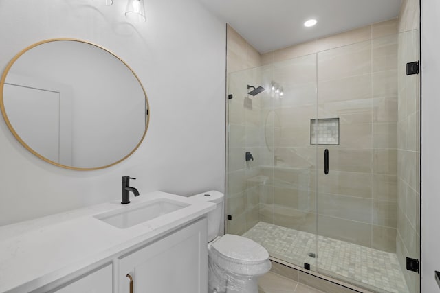 full bathroom featuring toilet, a shower stall, recessed lighting, and vanity