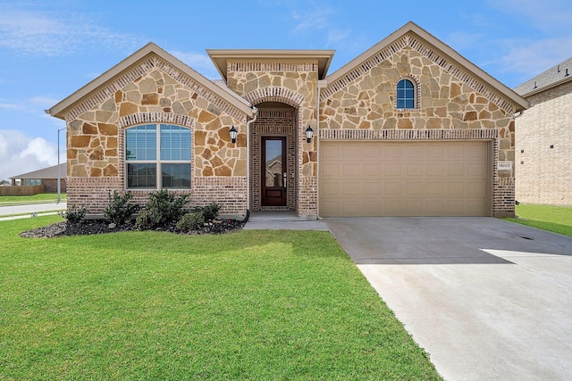 view of front facade with a garage, driveway, brick siding, and a front yard