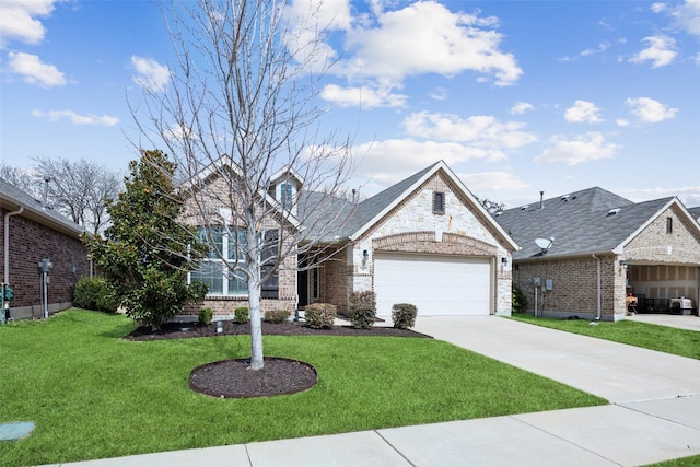 view of front of property featuring a garage, a front yard, concrete driveway, and brick siding