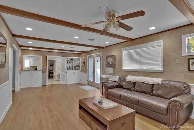 living area featuring recessed lighting, visible vents, french doors, light wood-type flooring, and beam ceiling