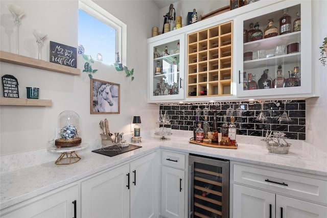 14402 Stice Rd, Krum, TX 76249 - indoor wet bar with beverage cooler and tasteful backsplash