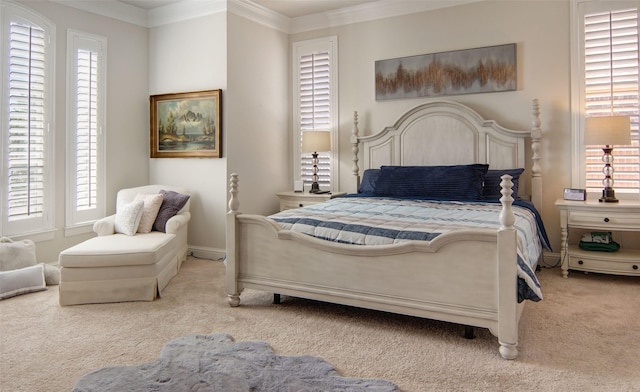 carpeted bedroom featuring ornamental molding