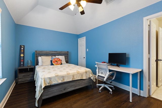 bedroom featuring lofted ceiling, ceiling fan, baseboards, and wood finished floors