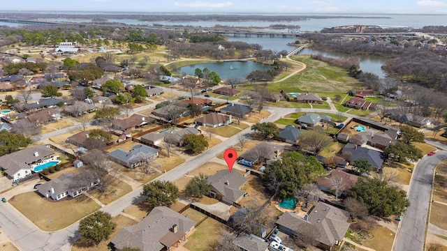 aerial view with a water view and a residential view