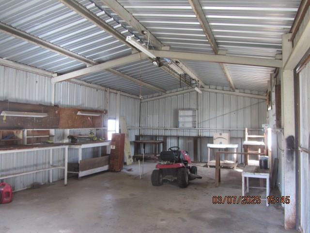 garage featuring metal wall