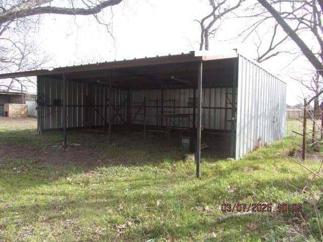 view of pole building featuring a detached carport