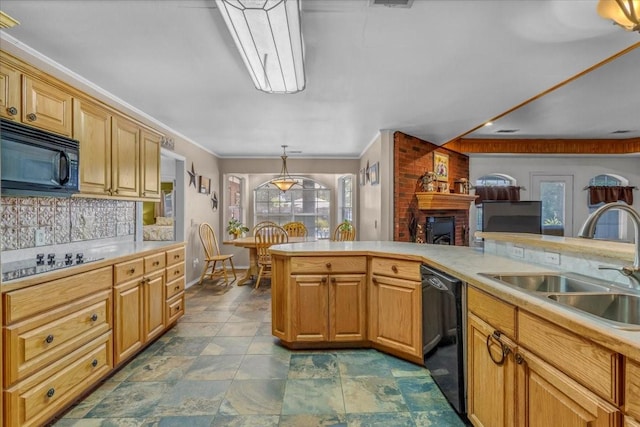 kitchen featuring a sink, light countertops, ornamental molding, backsplash, and black appliances