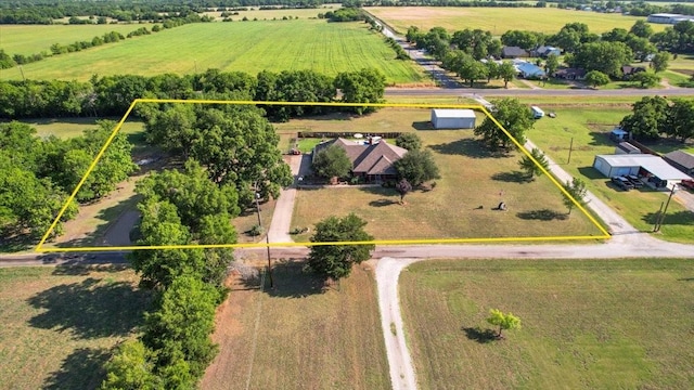 birds eye view of property featuring a rural view