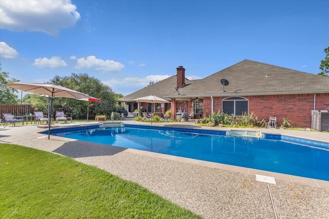 view of swimming pool featuring fence, a fenced in pool, and a patio