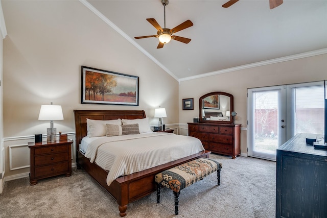 bedroom with light carpet, access to exterior, vaulted ceiling, and ornamental molding