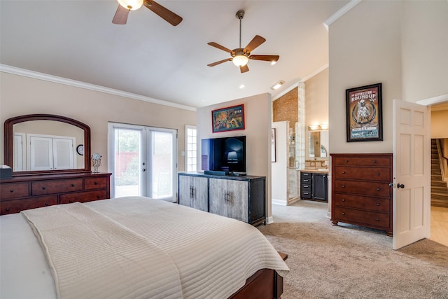 bedroom featuring lofted ceiling, ornamental molding, french doors, access to outside, and light colored carpet