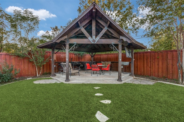 view of yard with a patio and a fenced backyard