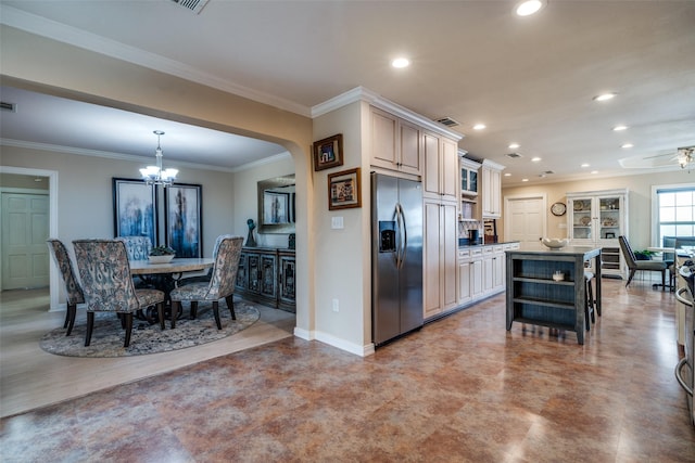 kitchen featuring a kitchen island, stainless steel fridge with ice dispenser, ornamental molding, recessed lighting, and open shelves