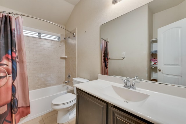 bathroom featuring vanity, lofted ceiling, tile patterned flooring, shower / bath combination with curtain, and toilet