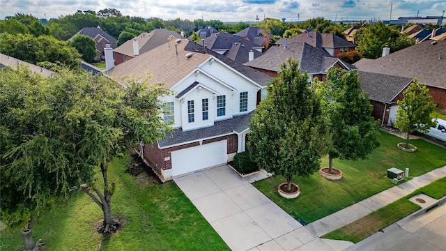 birds eye view of property with a residential view