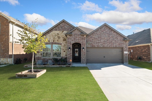 view of front facade featuring brick siding, an attached garage, concrete driveway, and a front yard