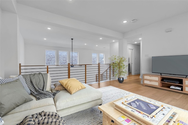 living area featuring recessed lighting and wood finished floors