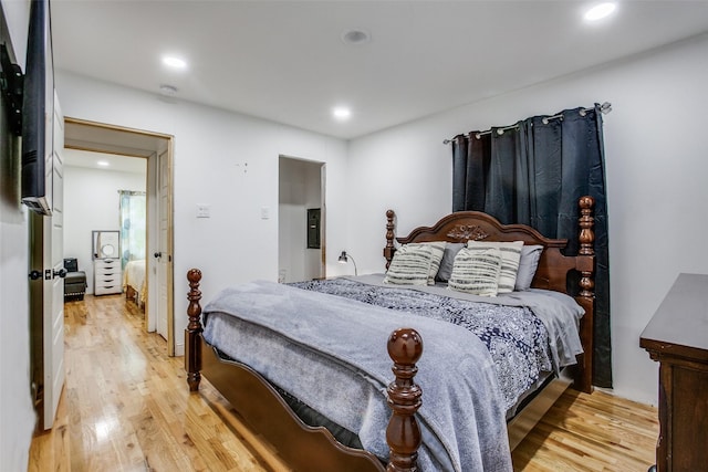 bedroom featuring light wood-style flooring and recessed lighting