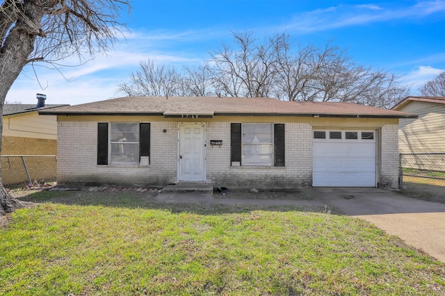 view of front facade with fence, concrete driveway, a front lawn, a garage, and brick siding