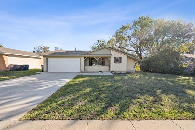 view of front facade with a garage, brick siding, concrete driveway, and a front yard