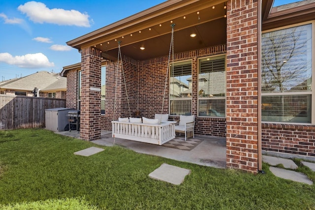 view of patio / terrace with outdoor lounge area and fence