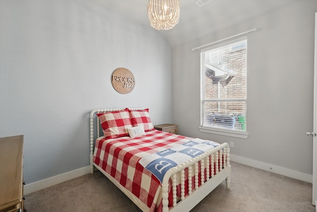 bedroom with baseboards, carpet floors, a chandelier, and vaulted ceiling