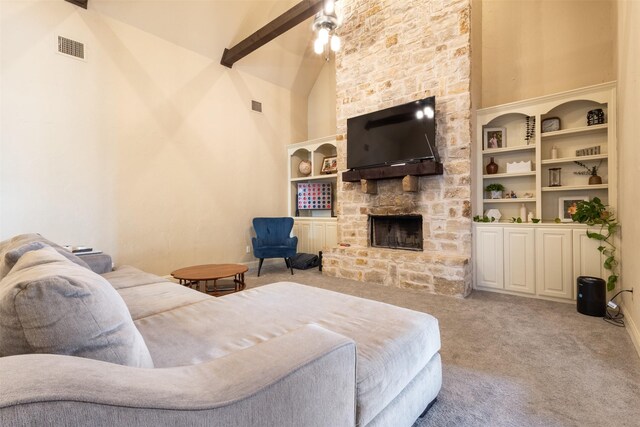 living area with visible vents, high vaulted ceiling, a stone fireplace, and carpet flooring