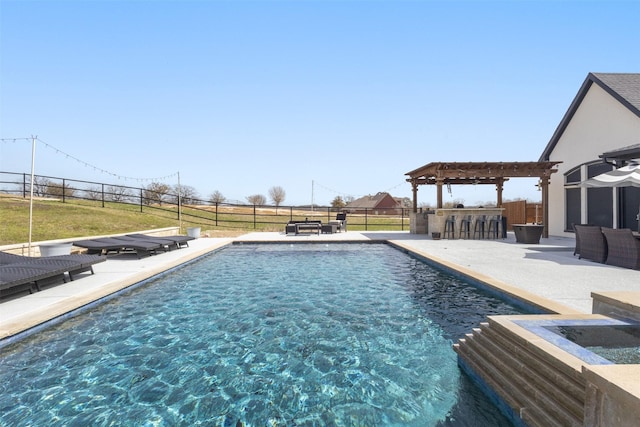 pool with a patio area, a fenced backyard, outdoor dry bar, and a pergola